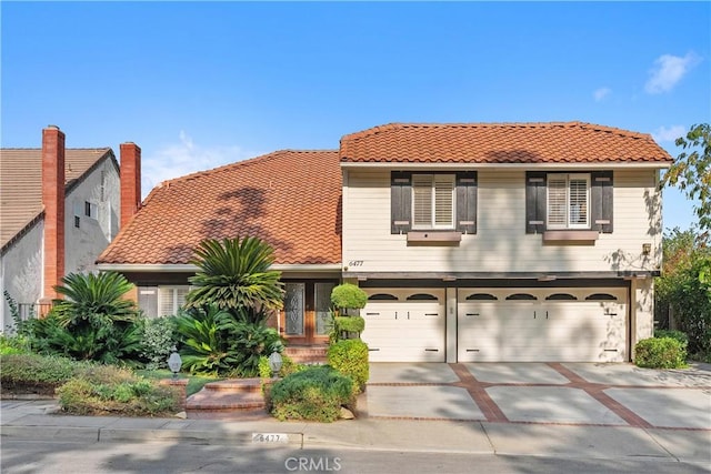 view of front of home with a garage