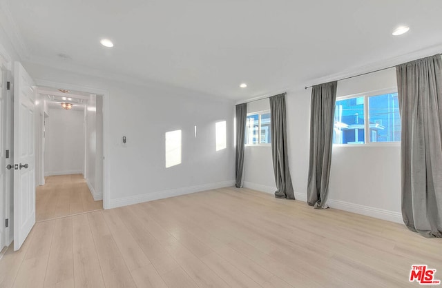 unfurnished room with a wealth of natural light and light wood-type flooring