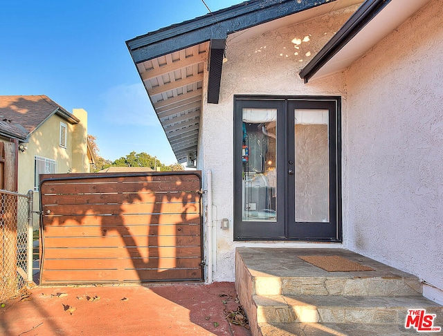 entrance to property with french doors