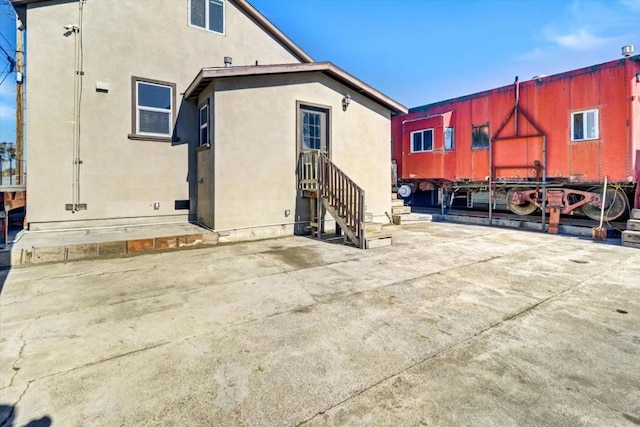 rear view of property with a patio area