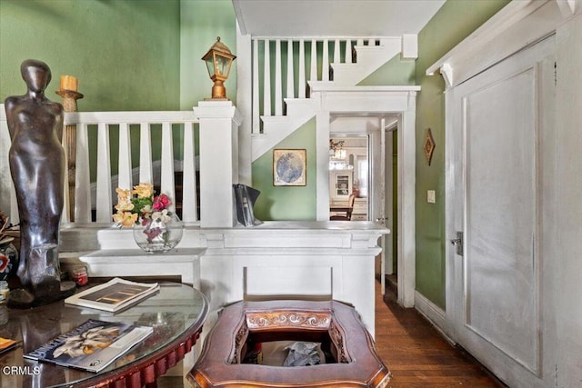 interior space with dark hardwood / wood-style flooring