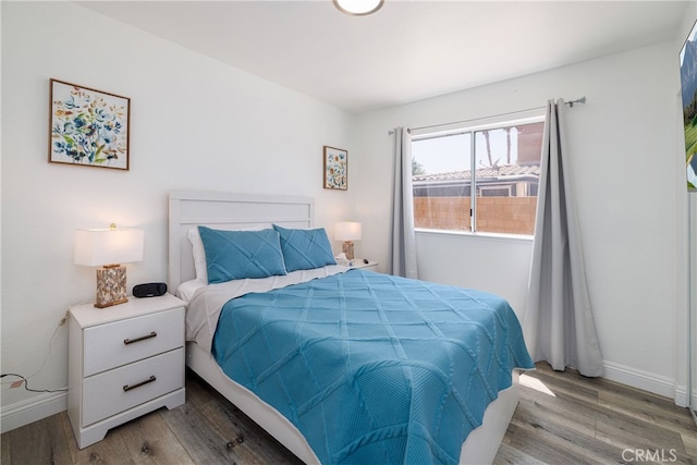 bedroom featuring light hardwood / wood-style flooring