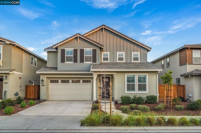 view of front of home with a garage