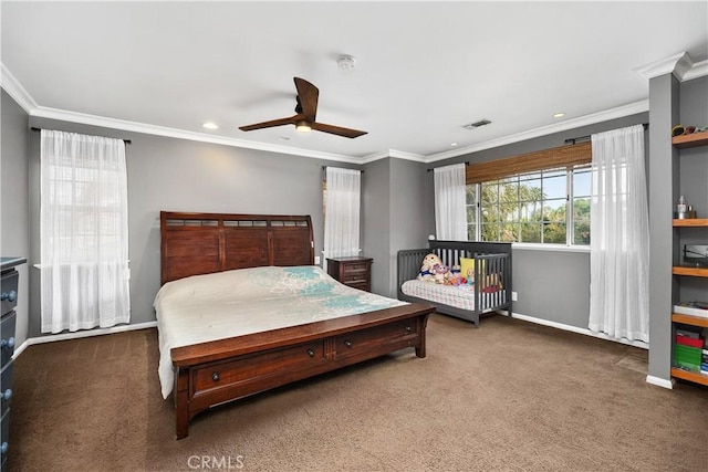 carpeted bedroom with ceiling fan and crown molding