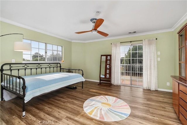 bedroom featuring ceiling fan, access to exterior, wood-type flooring, and crown molding