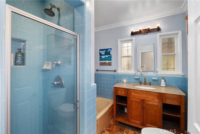 bathroom with vanity, crown molding, tile walls, and plus walk in shower