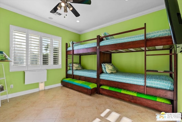 bedroom with ceiling fan and crown molding