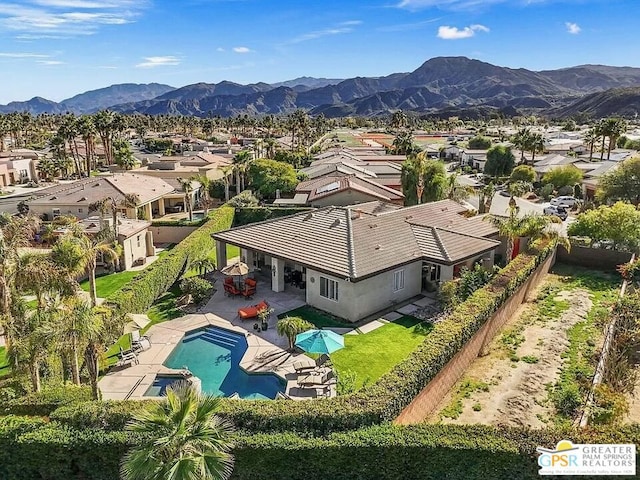 bird's eye view with a mountain view