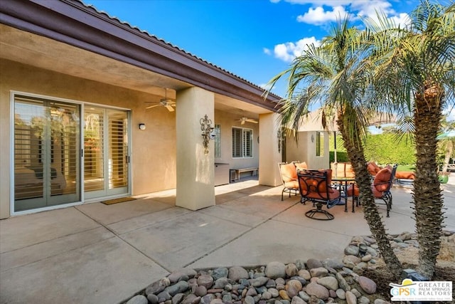 view of patio with ceiling fan