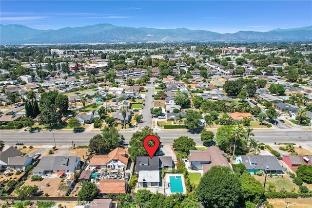 drone / aerial view featuring a mountain view