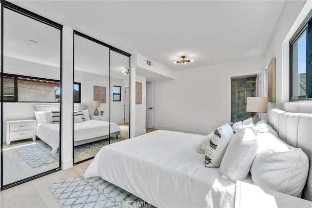 bedroom featuring light hardwood / wood-style flooring