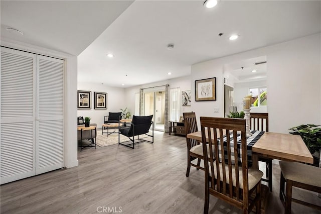 dining room with hardwood / wood-style floors