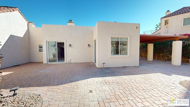 back of house featuring a patio