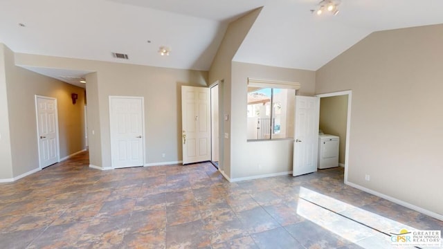 unfurnished bedroom with lofted ceiling