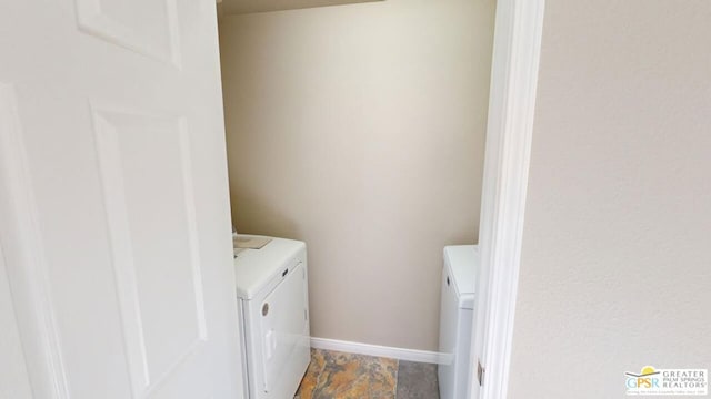 clothes washing area with independent washer and dryer