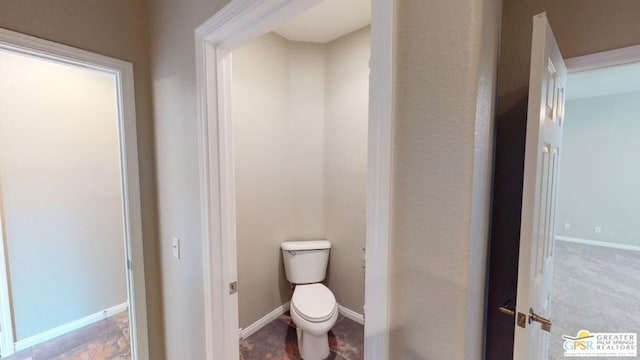 bathroom featuring toilet