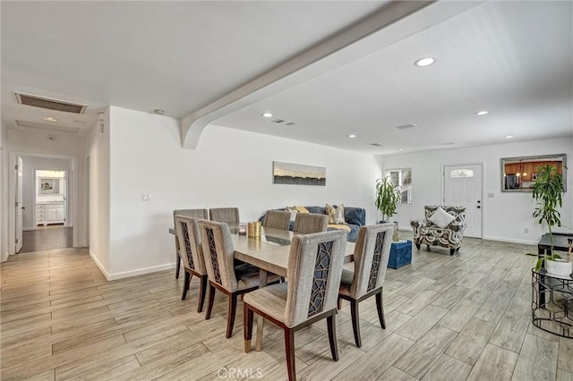 dining room with light hardwood / wood-style floors