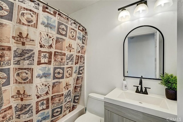 full bathroom featuring vanity, shower / bath combo, and toilet