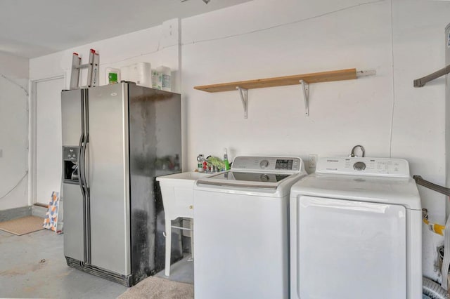 laundry area featuring washer and clothes dryer