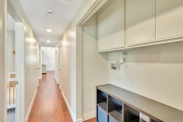 corridor featuring light hardwood / wood-style flooring