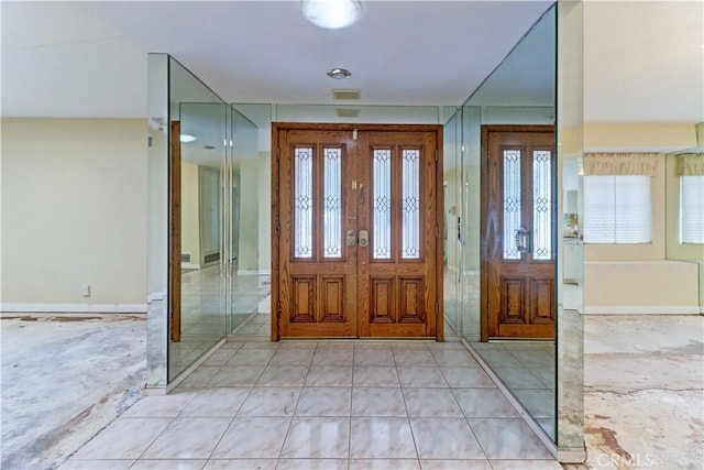 foyer entrance featuring a healthy amount of sunlight