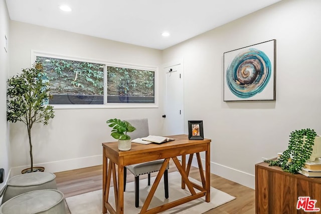 office area featuring light hardwood / wood-style flooring