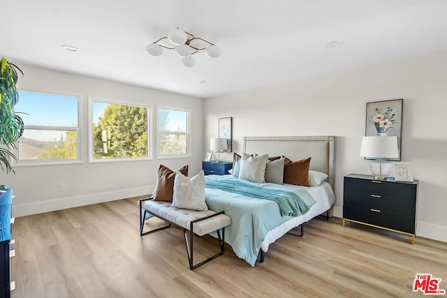 bedroom featuring light hardwood / wood-style flooring