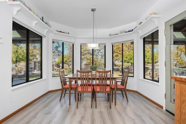 sunroom featuring a healthy amount of sunlight