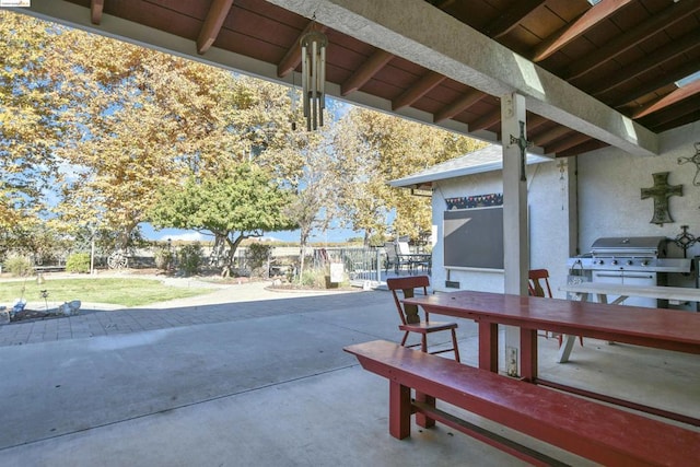 view of patio featuring a grill