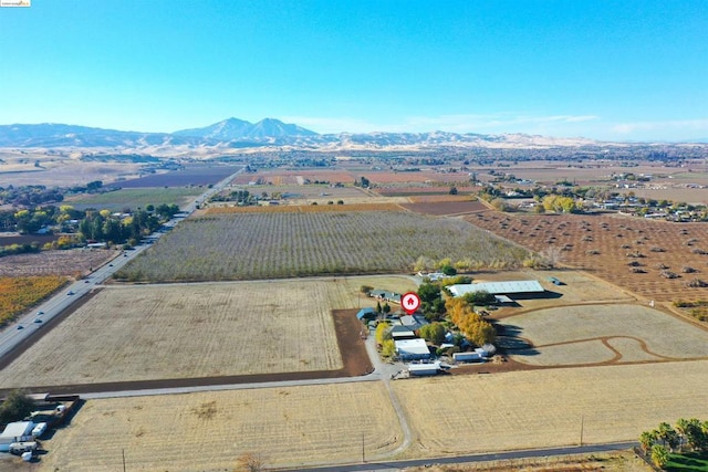 bird's eye view with a mountain view and a rural view