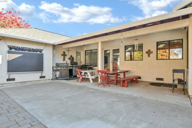 view of patio with a grill