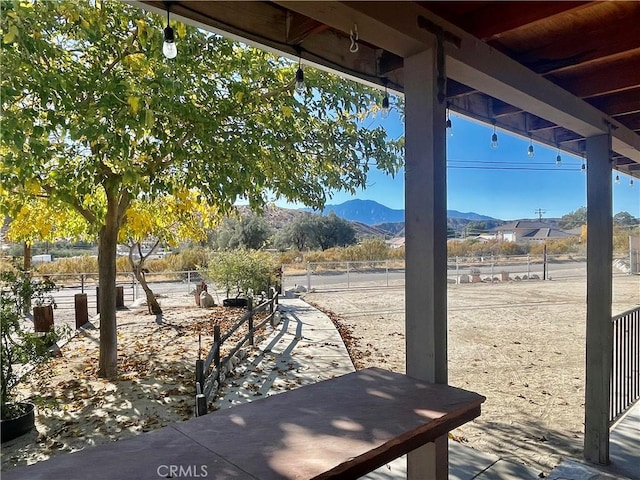 view of patio with a mountain view