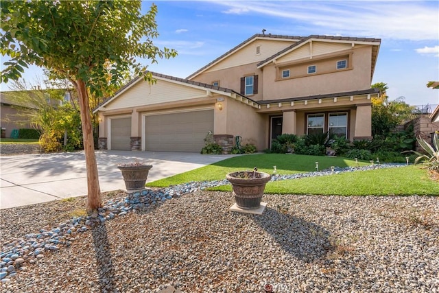 view of front of house with a front lawn and a garage