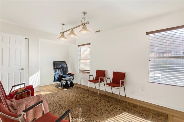 living area with wood-type flooring