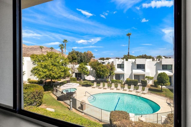 view of swimming pool featuring a patio area