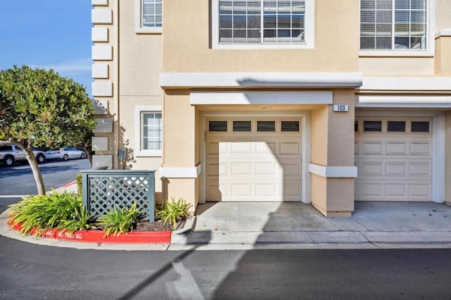 exterior space with a garage