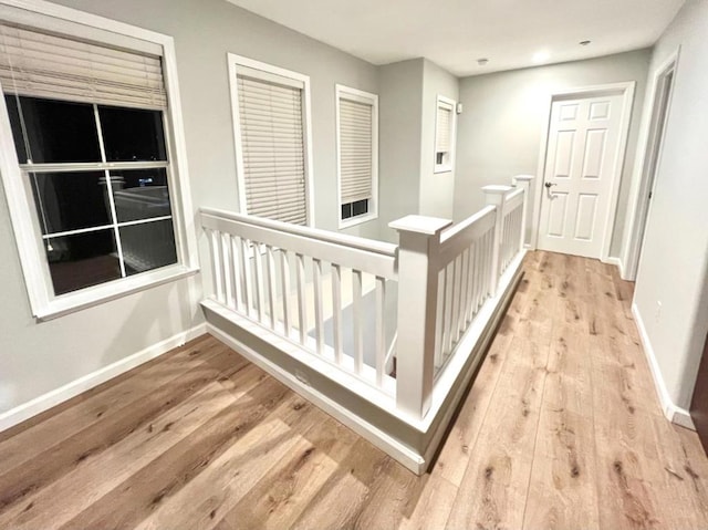 corridor featuring light hardwood / wood-style floors