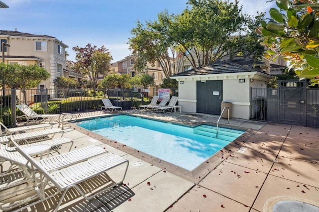 view of swimming pool featuring a patio