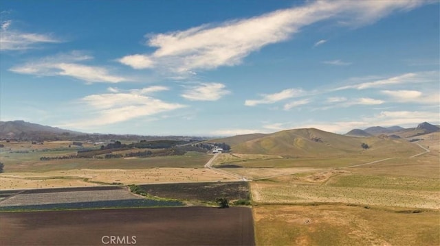 mountain view featuring a rural view