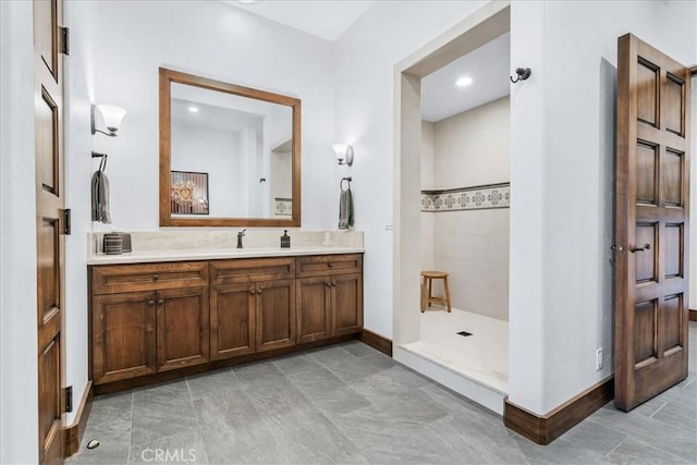 bathroom featuring vanity and walk in shower