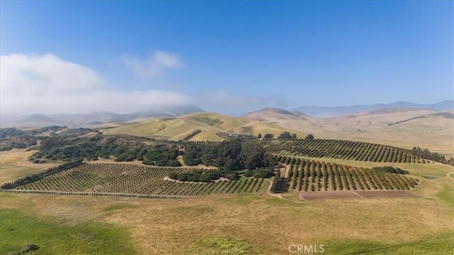 mountain view featuring a rural view