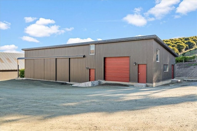 view of outdoor structure with a garage