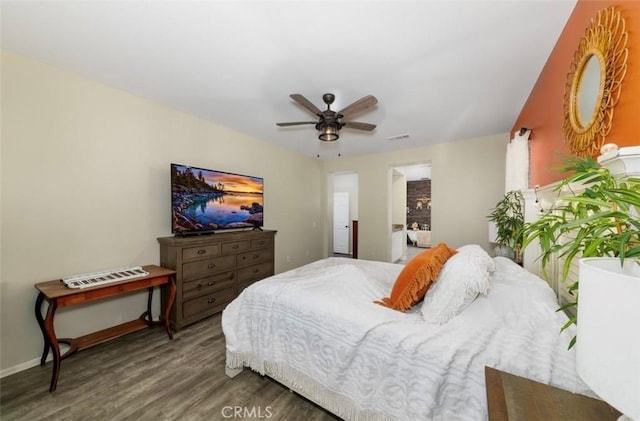 bedroom featuring hardwood / wood-style flooring and ceiling fan