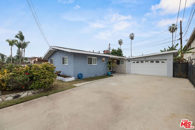 single story home with a garage