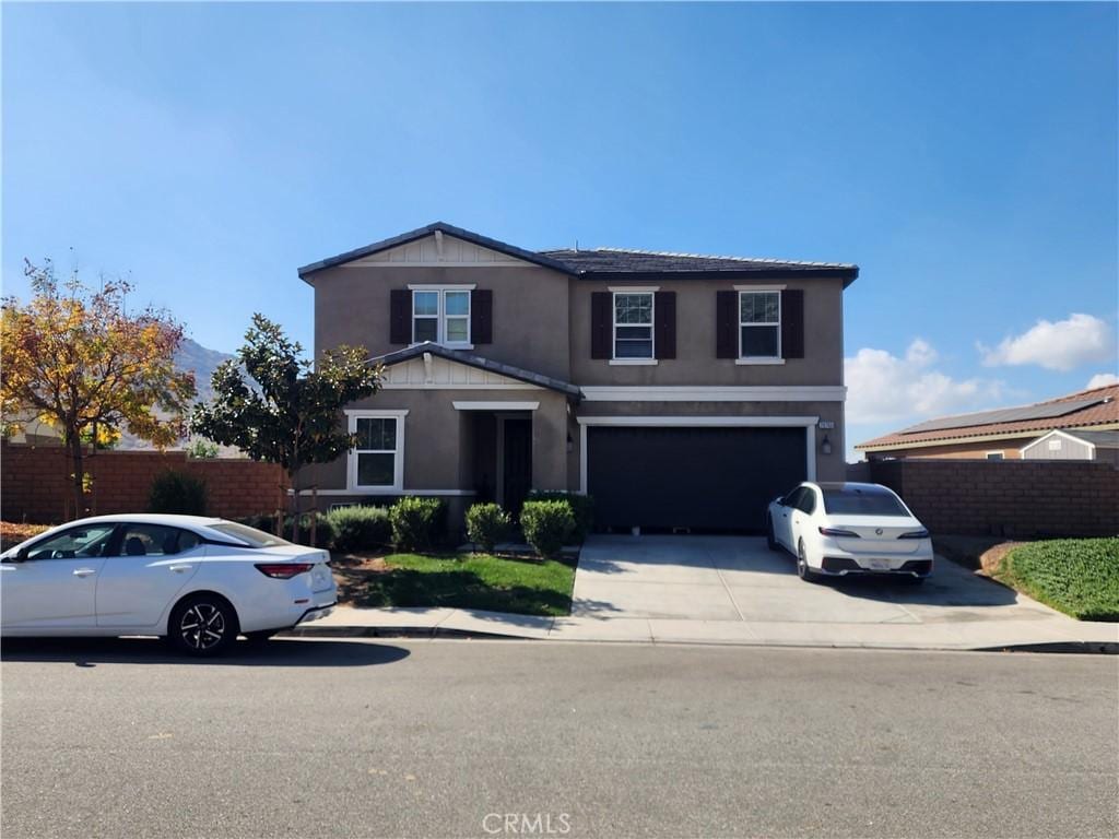 view of property with a garage