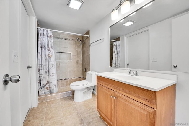 bathroom featuring tile patterned floors, vanity, toilet, and a shower with shower curtain