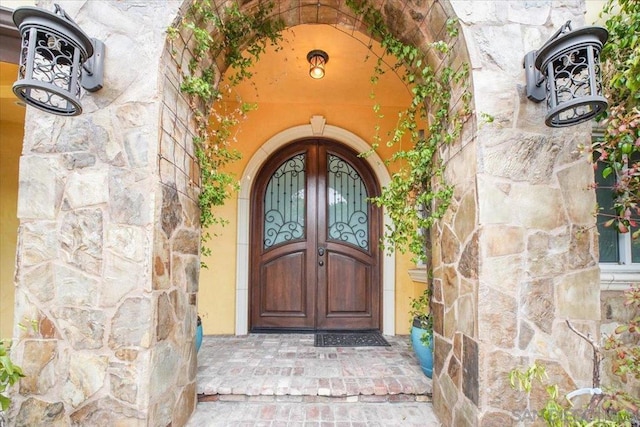 doorway to property with french doors