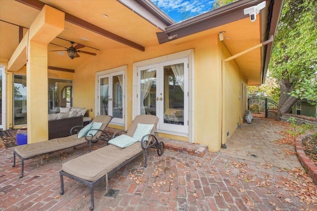 view of patio / terrace featuring outdoor lounge area, french doors, and ceiling fan