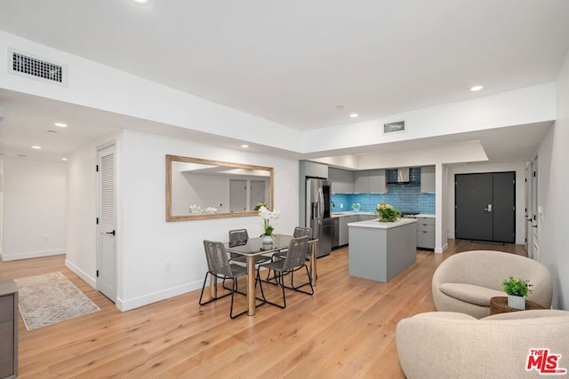 living room with light hardwood / wood-style floors