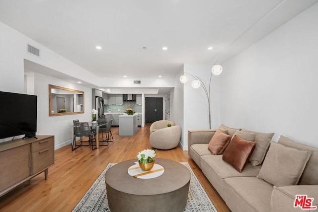 living room with hardwood / wood-style flooring